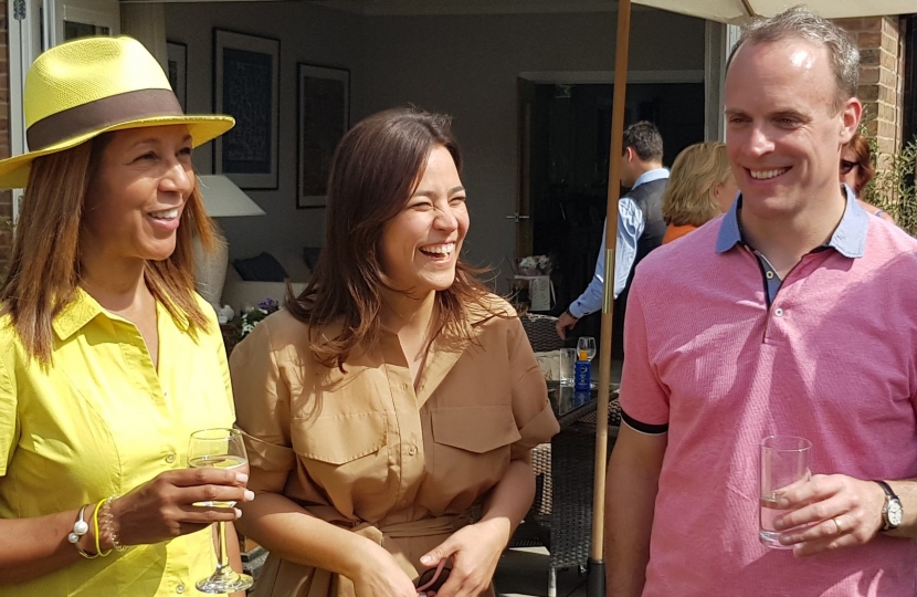 Helen with Erika and Dominic Raab relaxing at a family event.