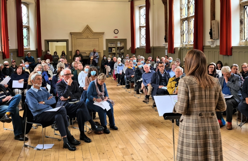 Helen addressing the public meeting